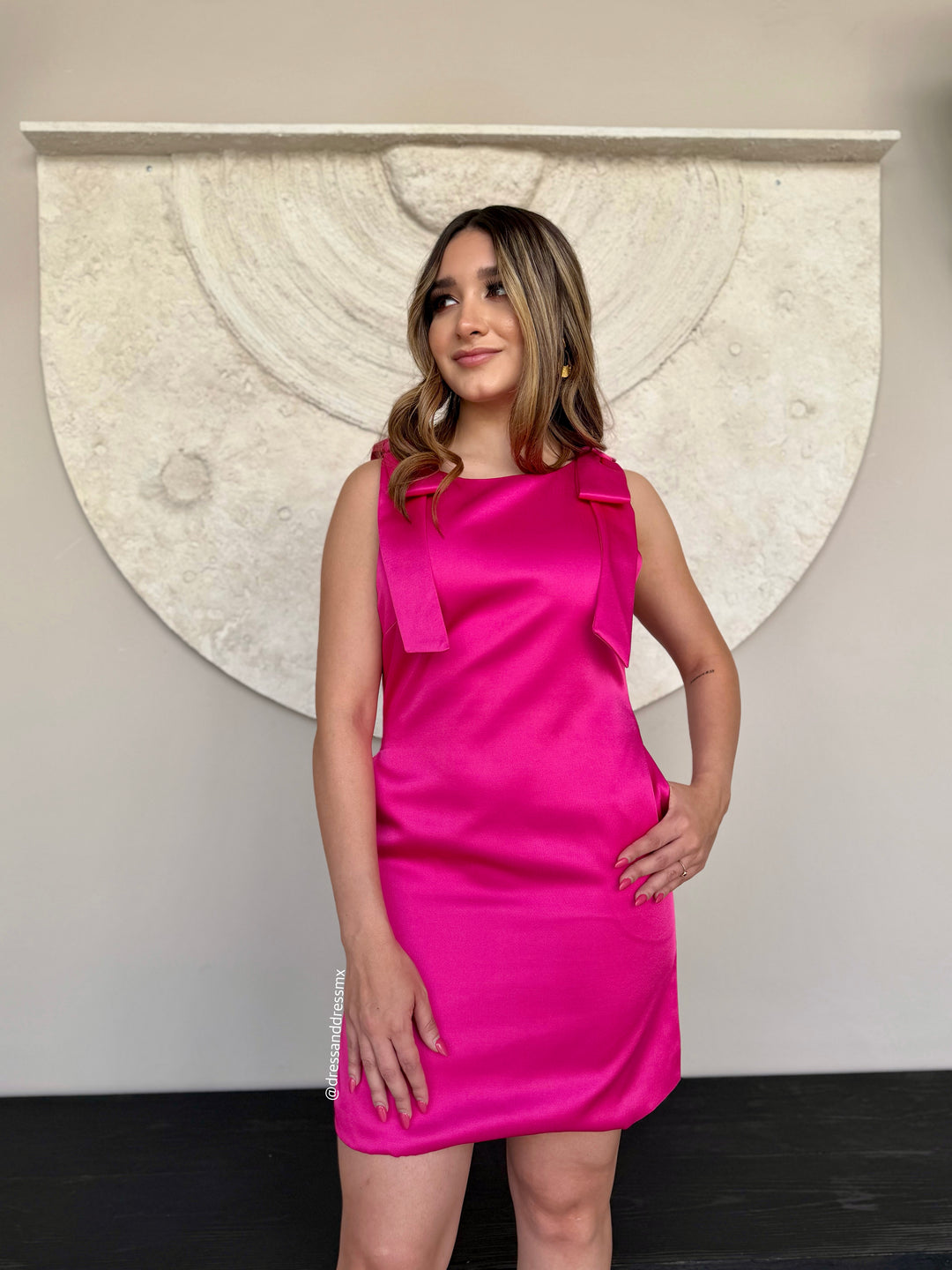 Vestido rosa fiuschia moños