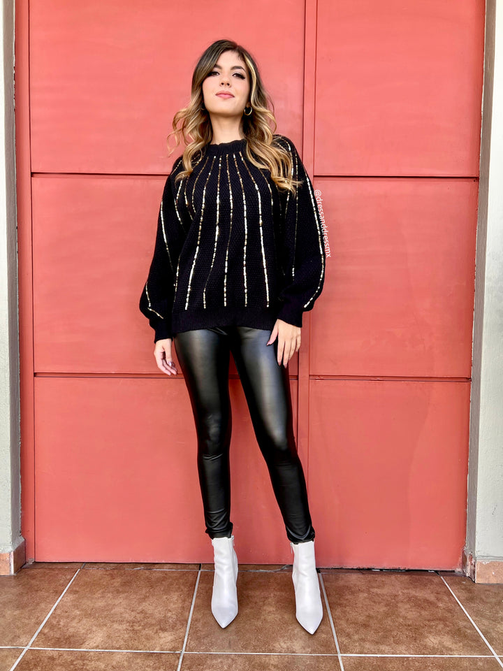 Suéter negro lentejuelas doradas