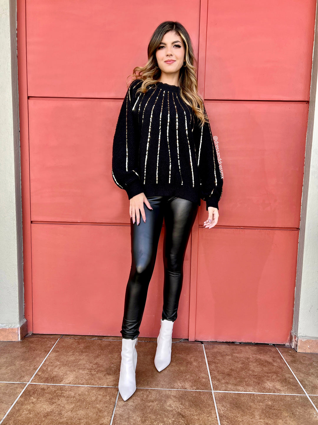 Suéter negro lentejuelas doradas